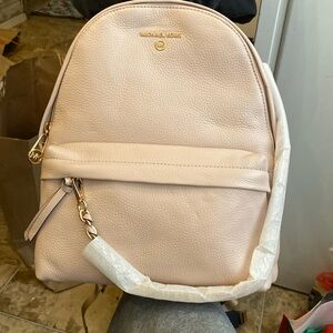Brand new pink beige leather, Michael Kors knapsack never used